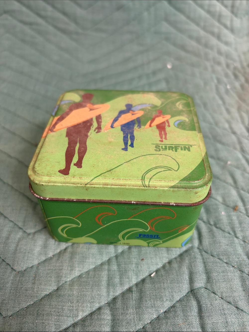 Fossil Green Surfing Wave Tin with Orange Accents